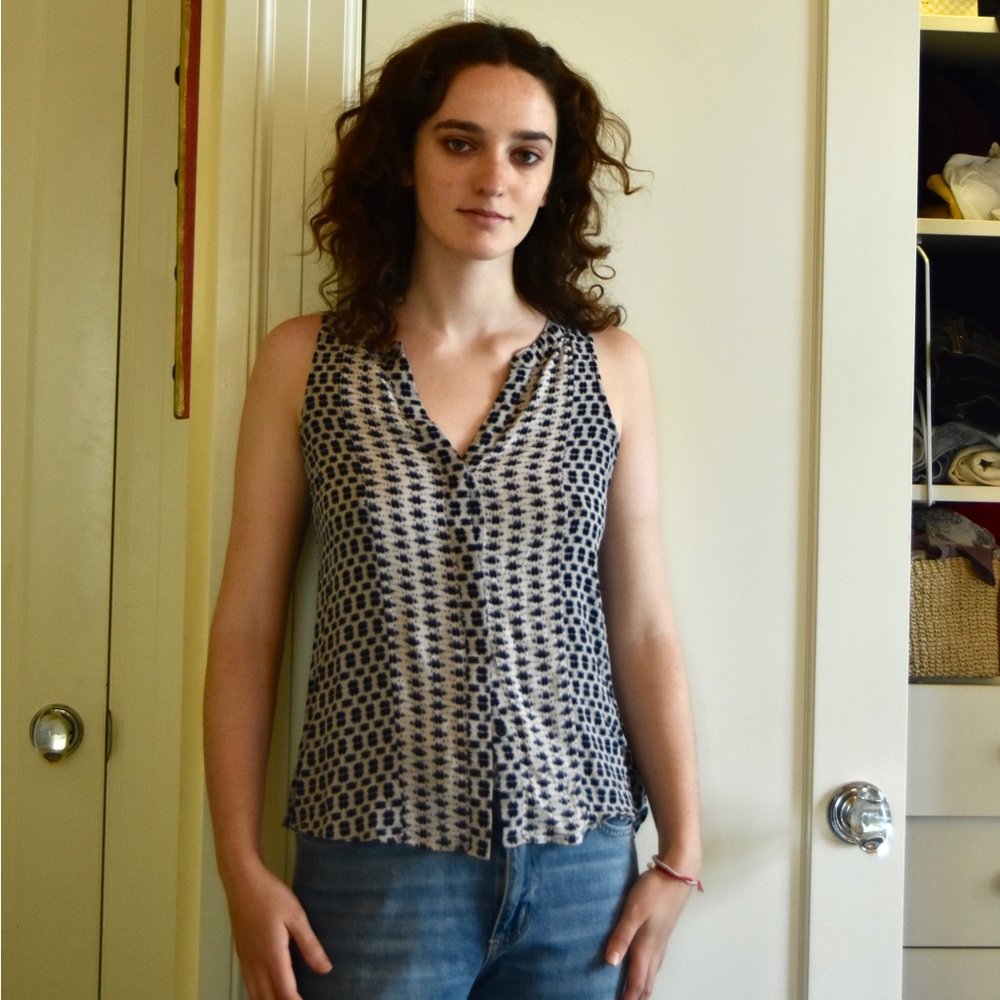 Sanctuary woman’s tank top Size small With with navy spots. Button up.